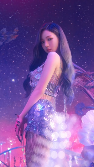 Karina from Aespa in a sparkly outfit