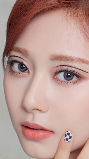 Tzuyu from TWICE with checkered nail art