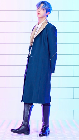 Soobin from TXT wearing a blue coat