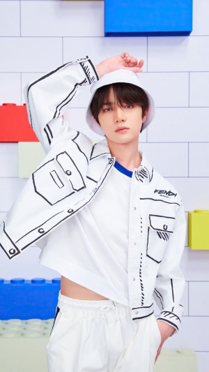 Beomgyu from TXT in White Fendi Outfit