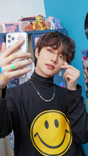 Beomgyu from TXT taking a selfie