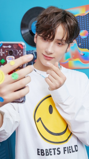 Huening Kai from TXT taking a selfie