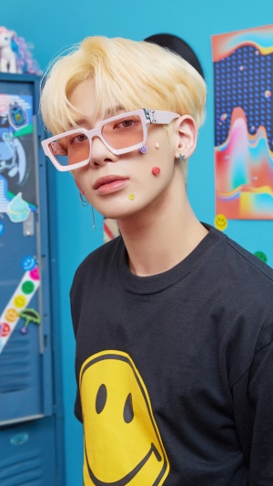 Taehyun from TXT wearing sunglasses