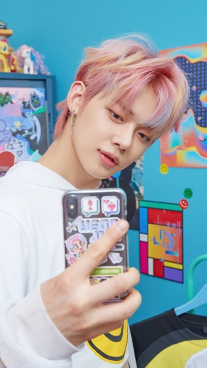 Yeonjun from TXT taking a selfie