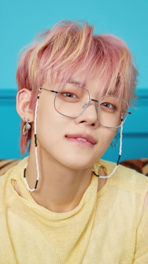 Yeonjun from TXT wearing glasses