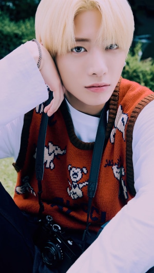 Taehyun from TXT in a photoshoot