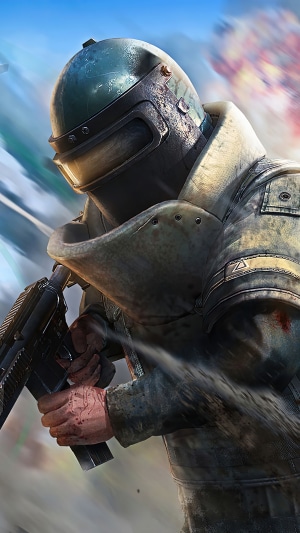 Player in PUBG armor holding a gun