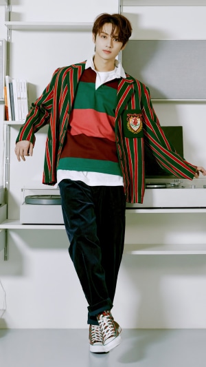 Jun from Seventeen wearing a striped blazer