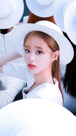 Chuu from Loona wearing a white hat