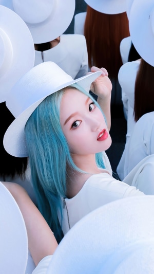 Go Won from Loona wearing a white hat