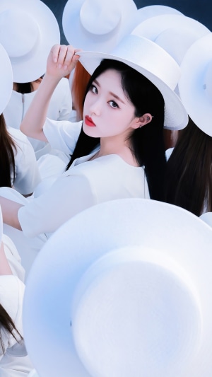 Olivia Hye from Loona wearing a white hat