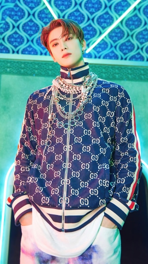 Jaehyun from NCT wearing a Gucci jacket