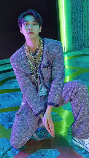 Doyoung from NCT U wearing a tweed suit and necklaces