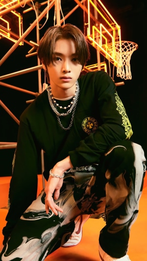 Sungchan from NCT U posing in a studio