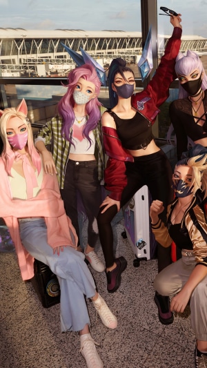 KDA members from League of Legends at an airport