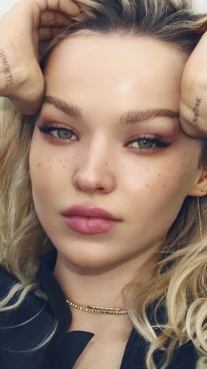 Dove Cameron posing for a photoshoot