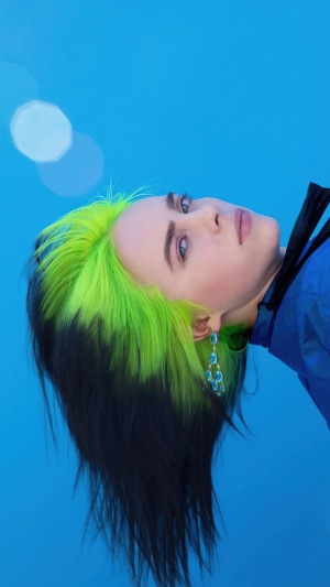 Billie Eilish with neon green hair