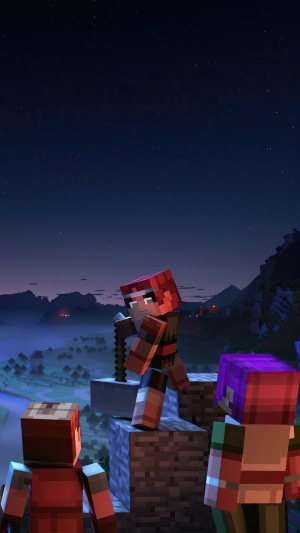 Minecraft Dungeons characters on a cliff at night