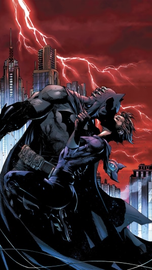 Batman and Catwoman kissing in Gotham City