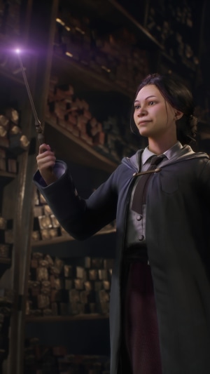 Hogwarts Legacy video game character with wand