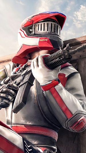 Player in PUBG Mobile armor holding a rifle