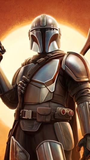 The Mandalorian holding a blaster
