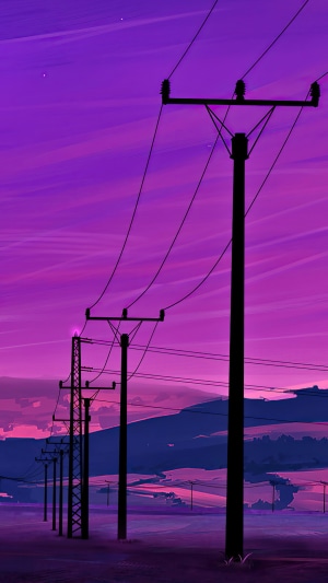 Electric poles against a vibrant purple sky