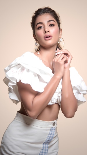 Pooja Hegde in white crop top and skirt