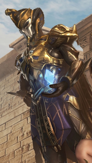 PUBG Mobile character in golden armor holding a crystal