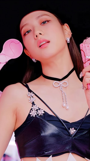 Jisoo from BLACKPINK holding an ice cream cone