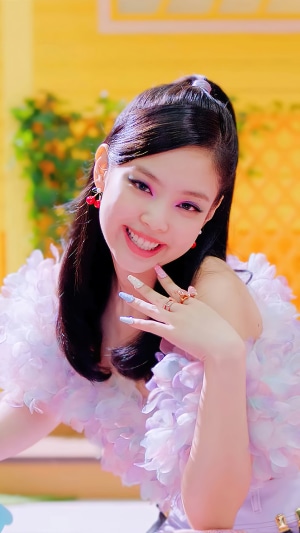 Jennie from BLACKPINK wearing cherry earrings