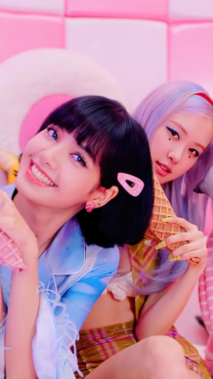 BLACKPINK members Lisa and Rosé with ice cream
