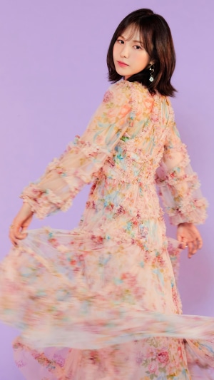 Wendy from Red Velvet in a floral dress