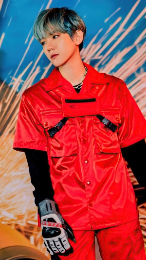 Baekhyun from SuperM in a red outfit