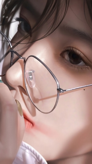 Close-up of a girl wearing glasses