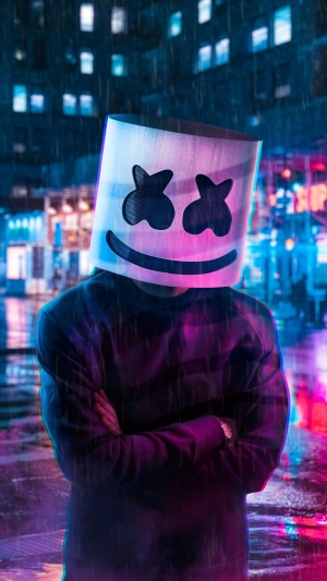 Marshmello DJ wearing mask in neon city at night
