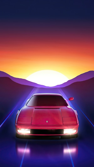 Red Ferrari Sports Car Driving Towards Sunrise