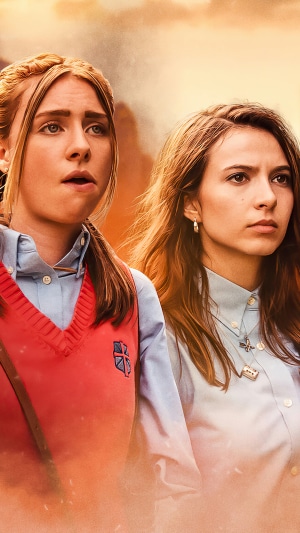 Two teenage girls in school uniforms