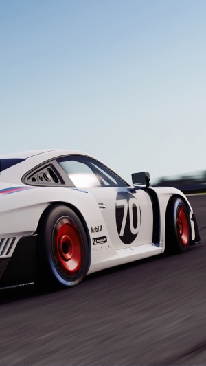 White Porsche 911 GT2 RS Clubsport with number 70 on a race track