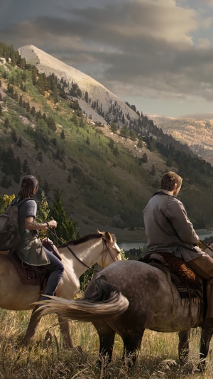 Joel and Ellie from The Last of Us Part II on horseback