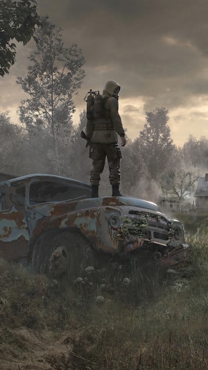 Stalker 2 character standing on a rusty car