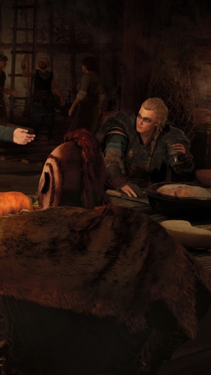 Assassins Creed Valhalla characters in a dimly lit room