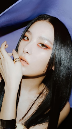 Seulgi from Red Velvet posing with purple fabric