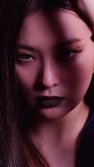 Seulgi from Red Velvet with dark lipstick