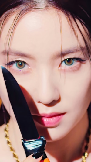 Irene Bae Joo Hyun from Red Velvet holding a knife