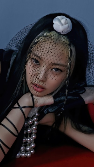 Jennie from BLACKPINK with veil and pearls