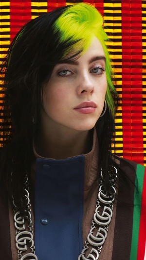 Billie Eilish with green and black hair