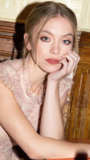 Sydney Sweeney posing with hand on chin