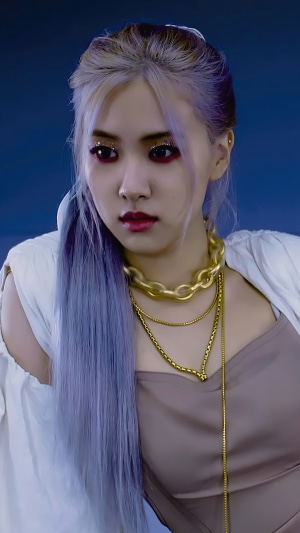 Rosé from BLACKPINK with purple hair and makeup
