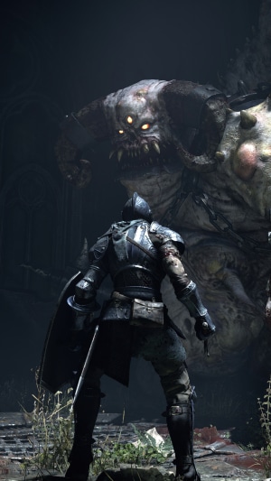 Demon's Souls Knight facing a large demon